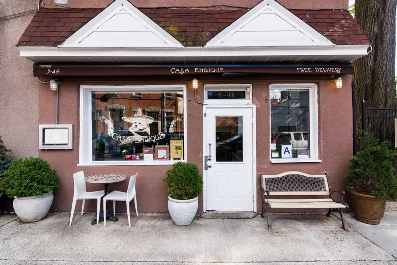 Storefront and sidewalk seating at Casa Enrique