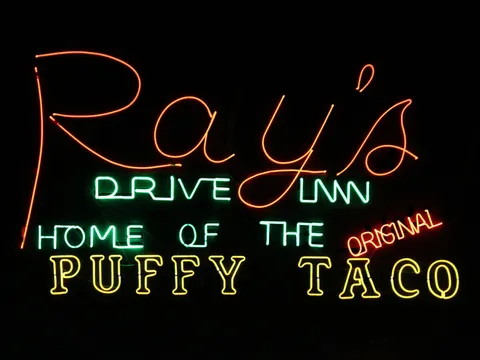 Ray's Drive Inn neon sign reading 'Home of the Original Puffy Taco' in San Antonio