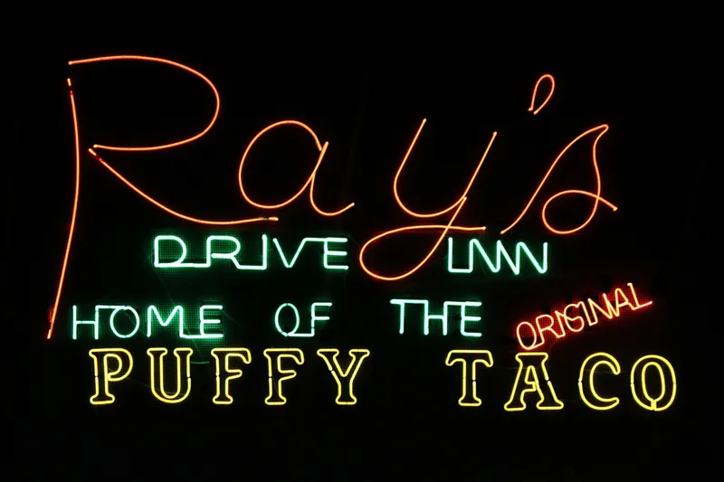 Ray's Drive Inn neon sign reading 'Home of the Original Puffy Taco' in San Antonio